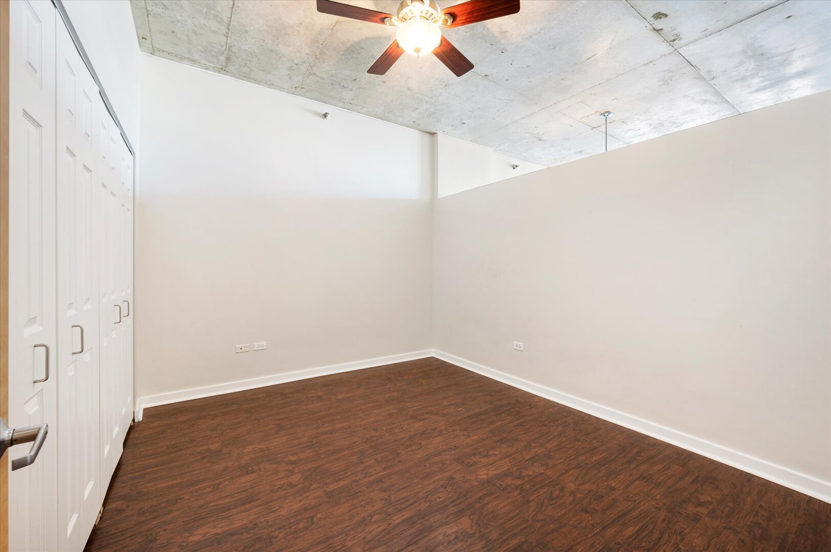 1720 South Michigan Avenue, Unit 1712 Chicago, IL 60616 - Photo 14 of 33 wooden floor in an empty room