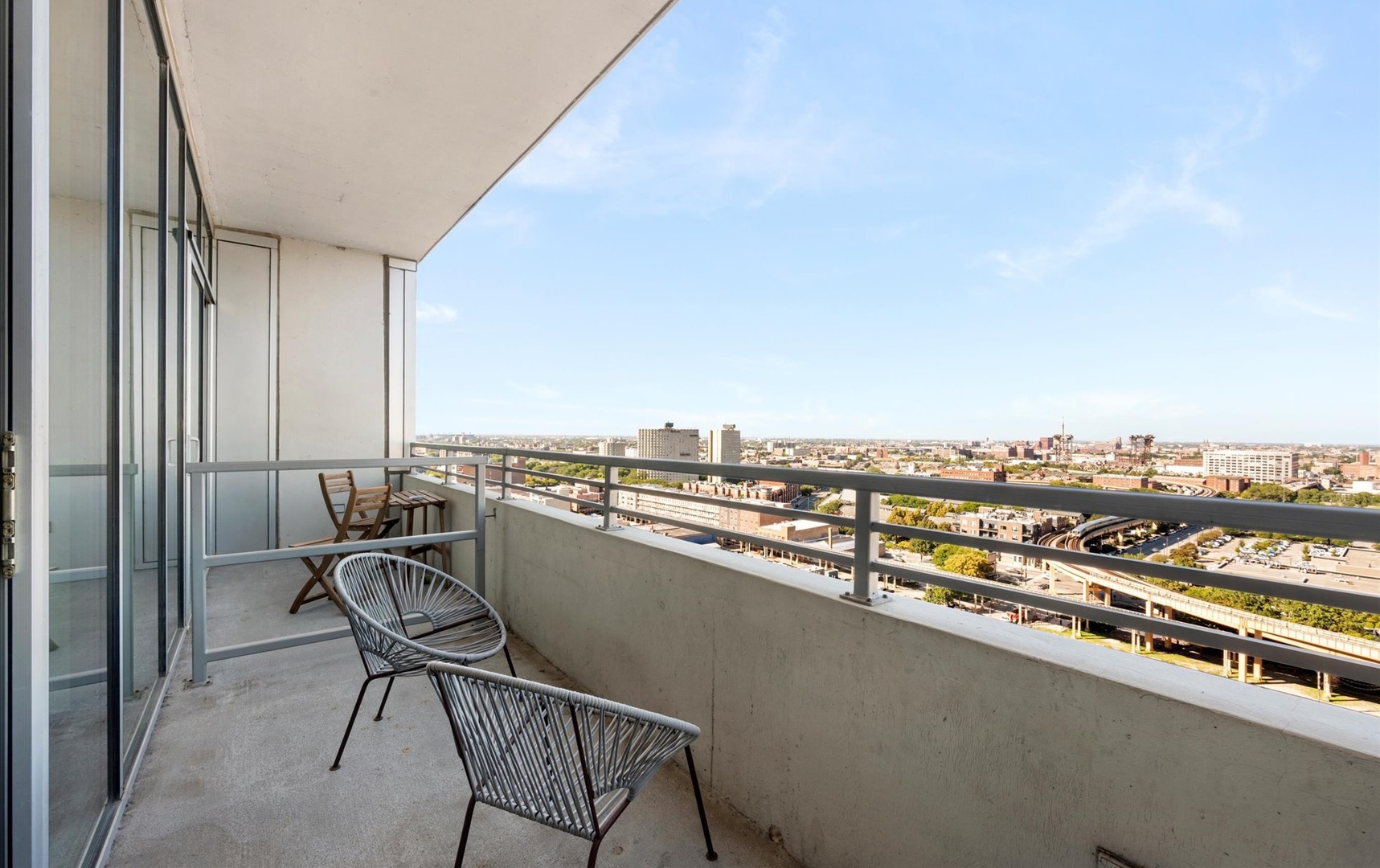 1720 South Michigan Avenue, Unit 1712 Chicago, IL 60616 - Photo 21 of 33 a view of a balcony with chairs