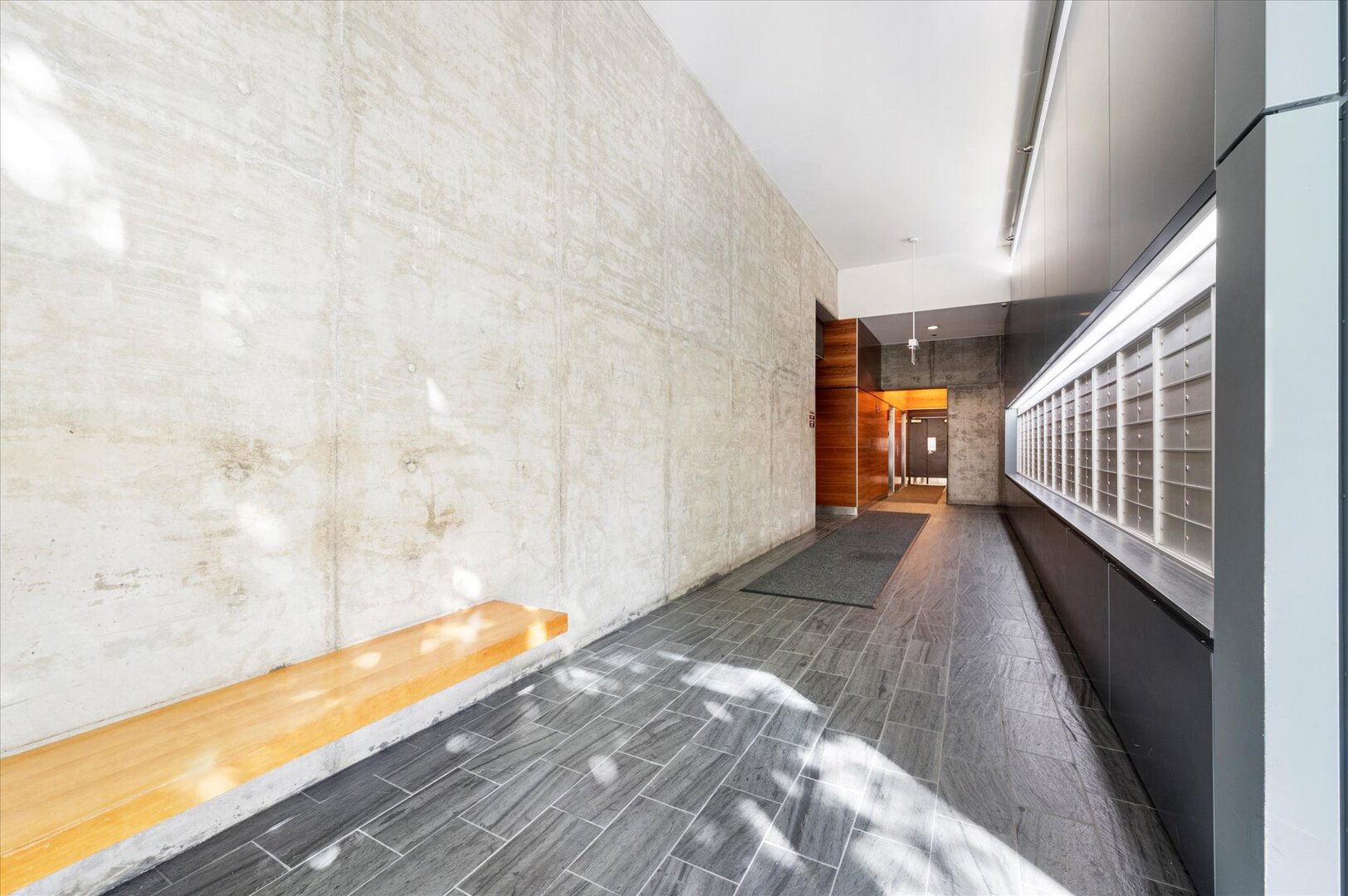 1720 South Michigan Avenue, Unit 1712 Chicago, IL 60616 - Photo 27 of 33 a view of hallway with wooden floor