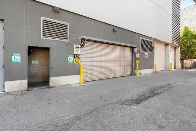 a view of a porch with a table and chairs