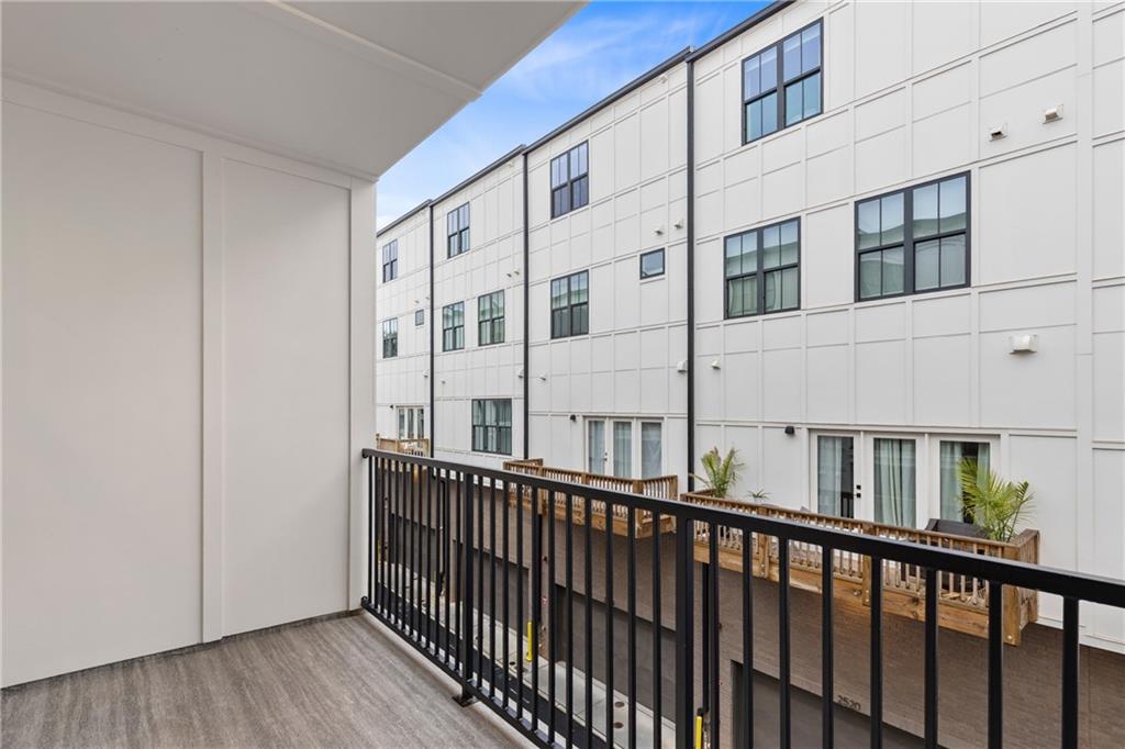 201 New Street, Unit 2304 Decatur, GA 30030 - Photo 25 of 28 a view of a building from a balcony