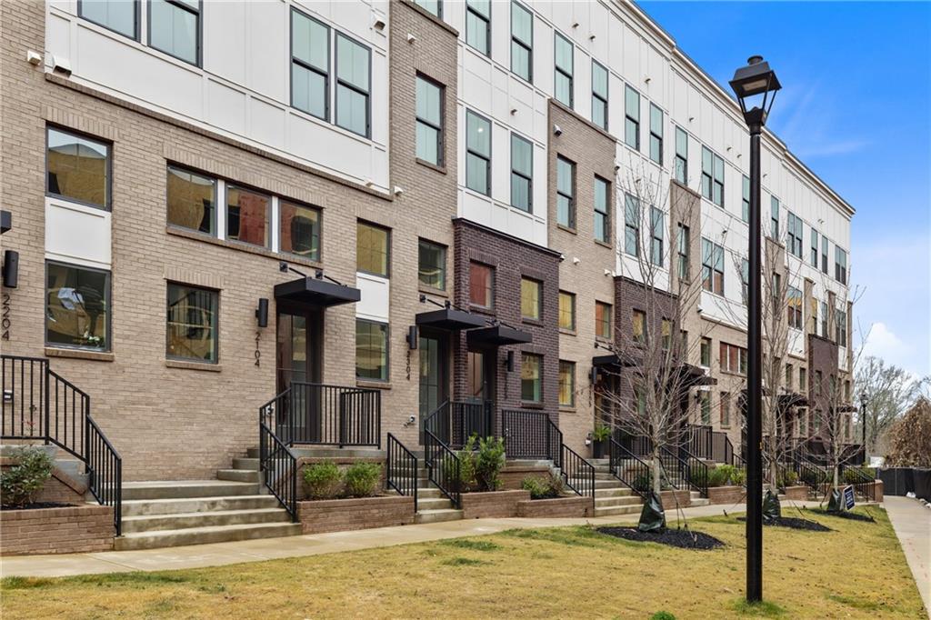 201 New Street, Unit 2304 Decatur, GA 30030 - Photo 3 of 28 a view of a building with street view