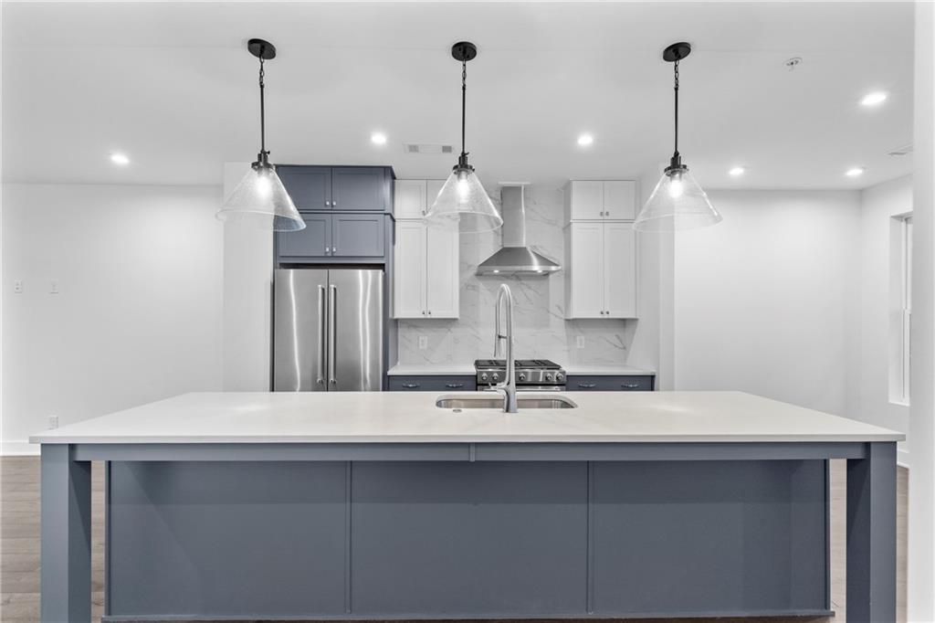 201 New Street, Unit 2304 Decatur, GA 30030 - Photo 4 of 28 a bathroom with a sink and a mirror