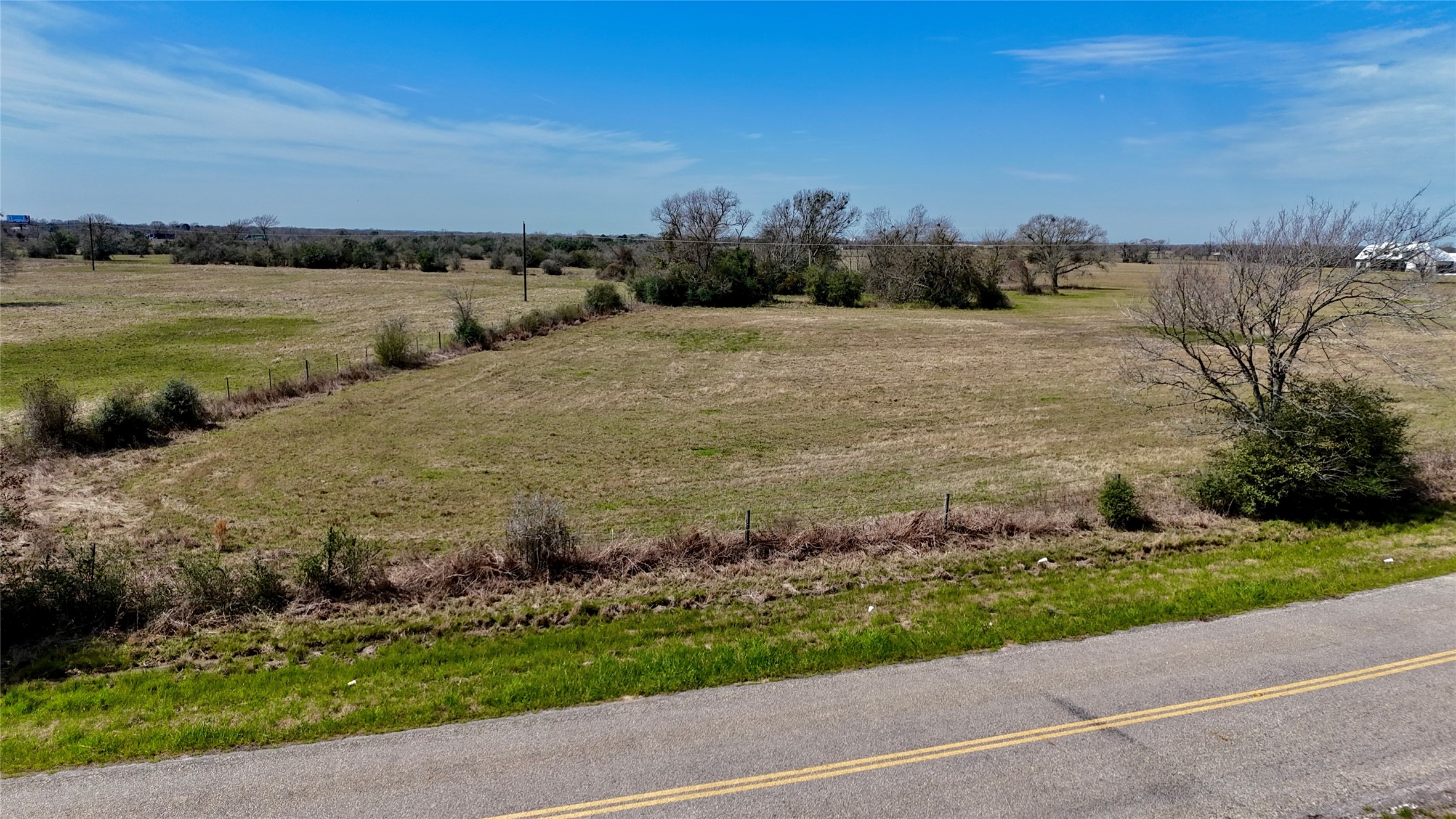 23579 Jones Road Hempstead, TX 77445 - Photo 3 of 12 a view of a lake with houses in back