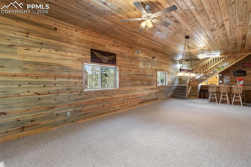 351 Porphry Road Florissant, CO 80816 - Photo 29 of 43 Game room and dry bar
