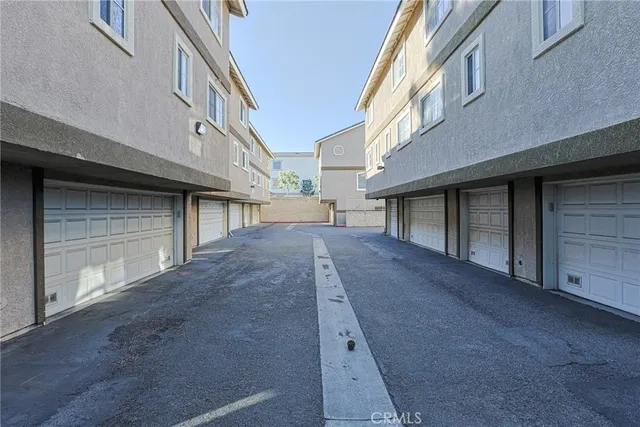 a view of a house with a street