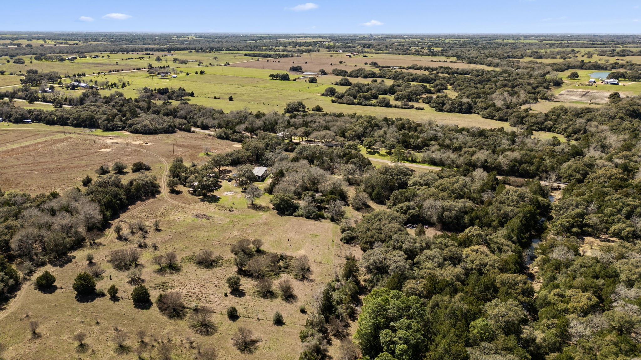 209 Cr 209 Road Weimar, TX 78962 - Photo 11 of 16 an aerial view of a houses with a beach