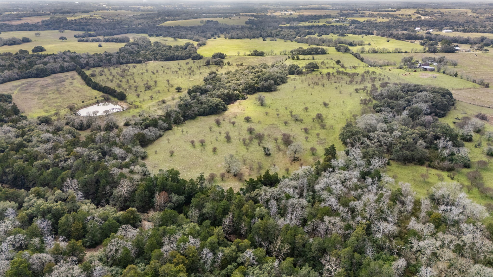 209 Cr 209 Road Weimar, TX 78962 - Photo 2 of 16 an aerial view of a house with a lake view