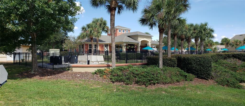 4245 Southwest 50th Circle Ocala, FL 34474 - Photo 11 of 14 front view of a house with a yard