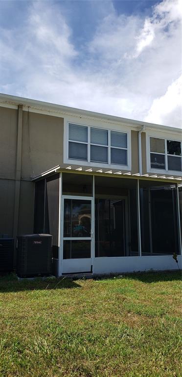 4245 Southwest 50th Circle Ocala, FL 34474 - Photo 13 of 14 a view of a house with a backyard