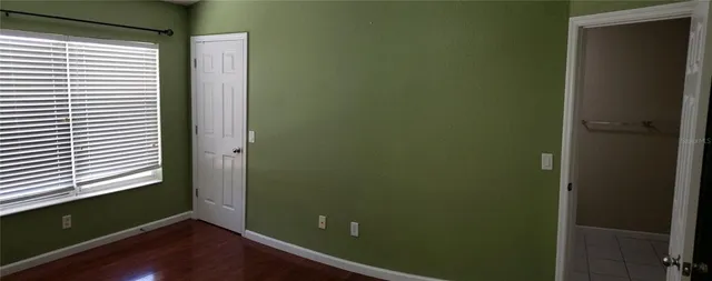 a view of a room that has a window in it