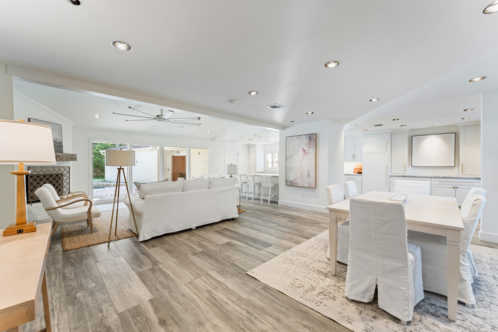 10703 Deerwood Road Houston, TX 77042 - Photo 15 of 28 Another perspective of the bright and open living and dining areas. Recessed lighting, Porcelain tile floors, neutral paint colors and top of the line finishes throughout.