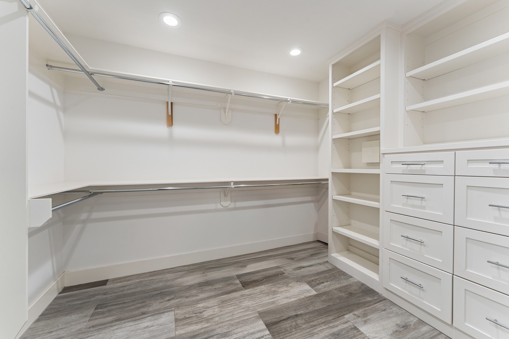 10703 Deerwood Road Houston, TX 77042 - Photo 10 of 28 Incredible walk-in closet with custom shelving.