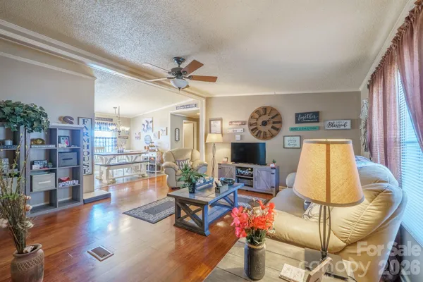 a bathroom with a double vanity sink a large mirror and shower