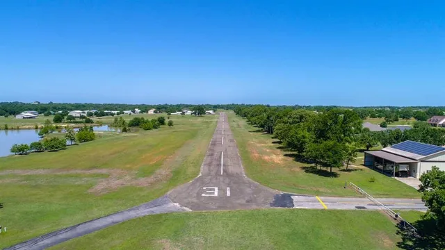 an aerial view of a house with a garden