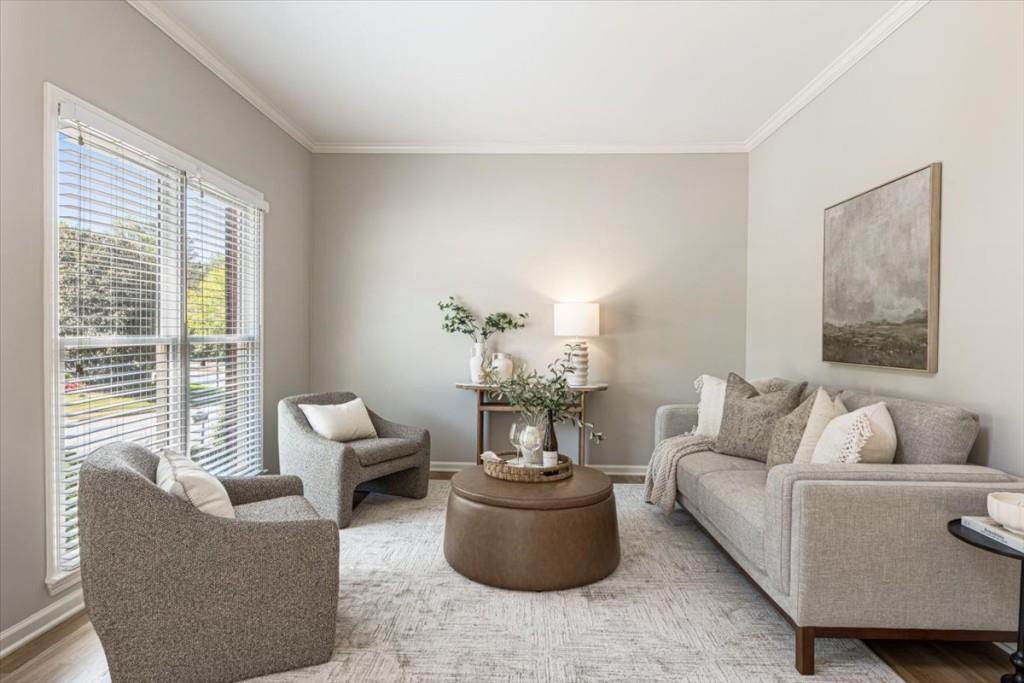 1110 Compass Pointe Crossing Alpharetta, GA 30005 - Photo 11 of 55 a living room with furniture and a large window