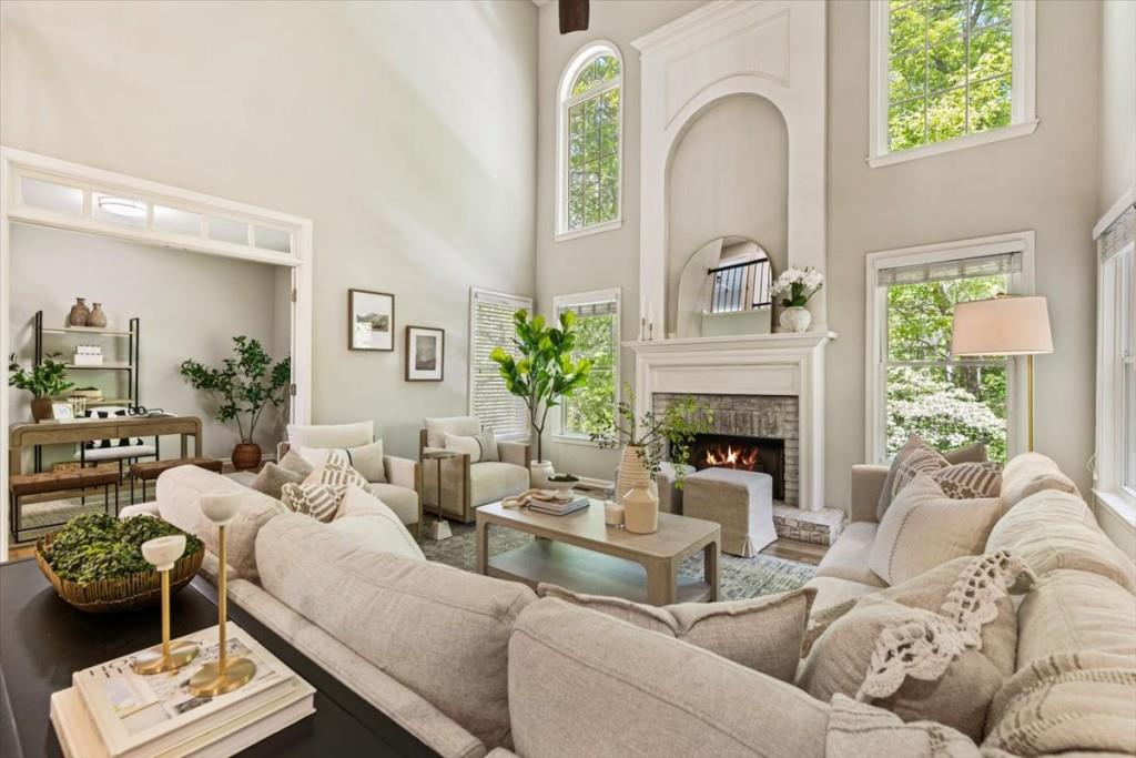 1110 Compass Pointe Crossing Alpharetta, GA 30005 - Photo 16 of 55 a living room with furniture and a fireplace