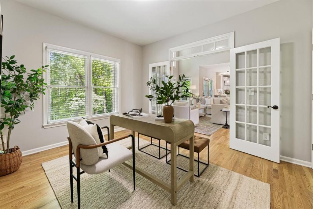 1110 Compass Pointe Crossing Alpharetta, GA 30005 - Photo 17 of 55 a dining room with furniture and wooden floor