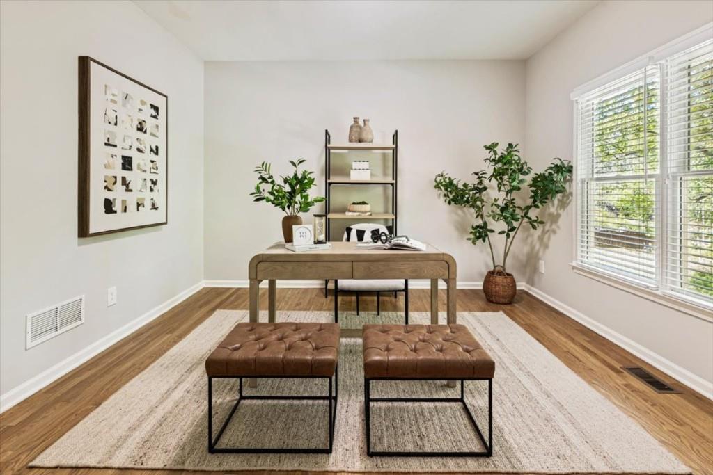1110 Compass Pointe Crossing Alpharetta, GA 30005 - Photo 18 of 55 a living room with furniture and a potted plant