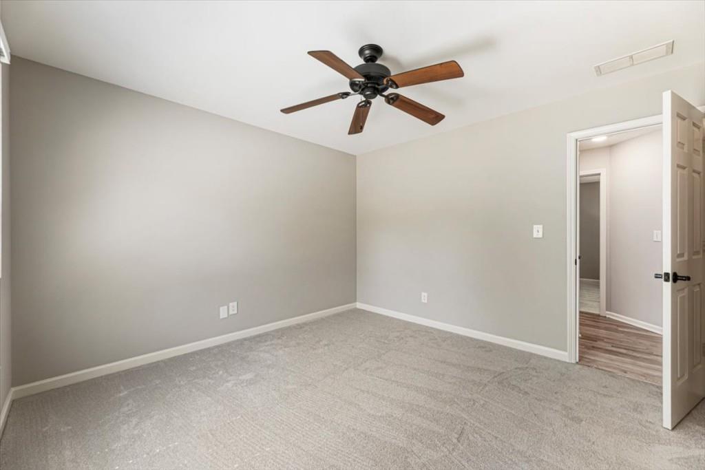 1110 Compass Pointe Crossing Alpharetta, GA 30005 - Photo 36 of 55 a view of an empty room with window
