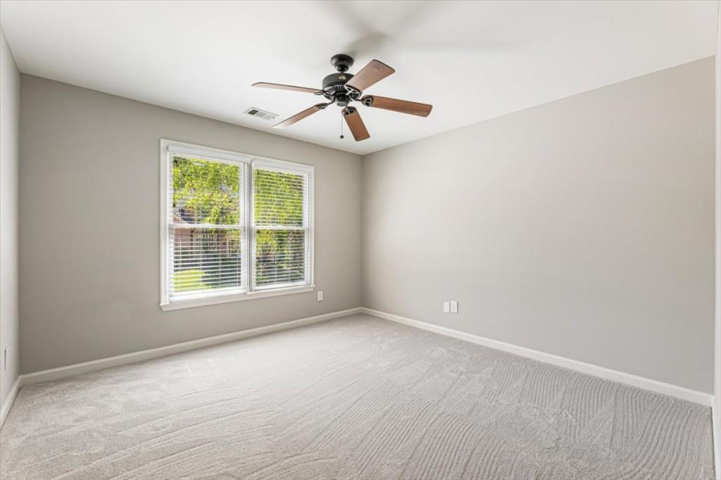 1110 Compass Pointe Crossing Alpharetta, GA 30005 - Photo 37 of 55 a view of an empty room with a window