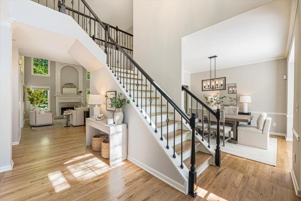 1110 Compass Pointe Crossing Alpharetta, GA 30005 - Photo 9 of 55 a view of entryway and hall with wooden floor