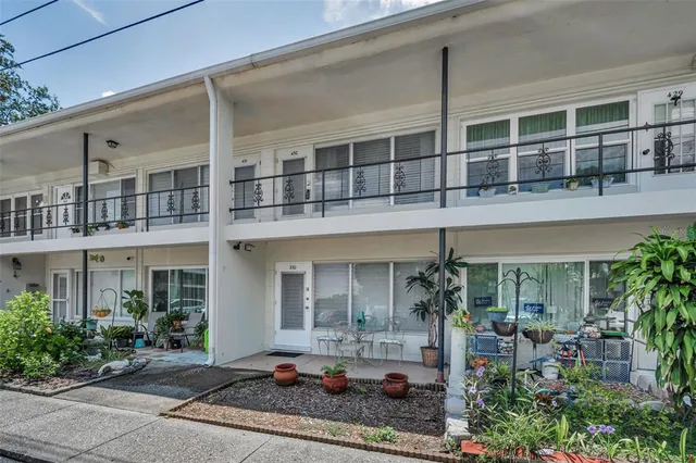 a front view of a house with a porch
