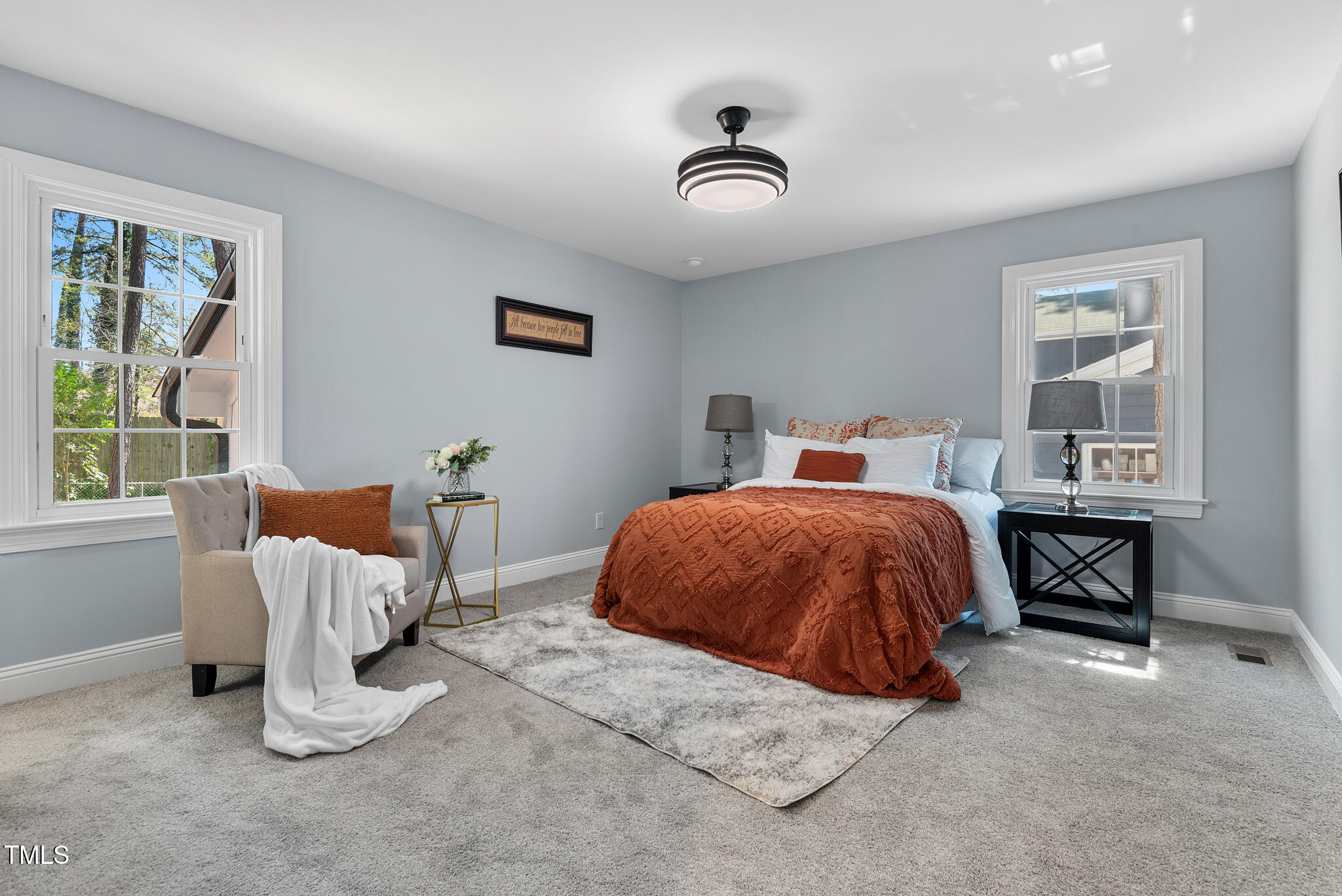 5812 Timber Ridge Drive Raleigh, NC 27609 - Photo 19 of 38 a bed room with a bed and a chair