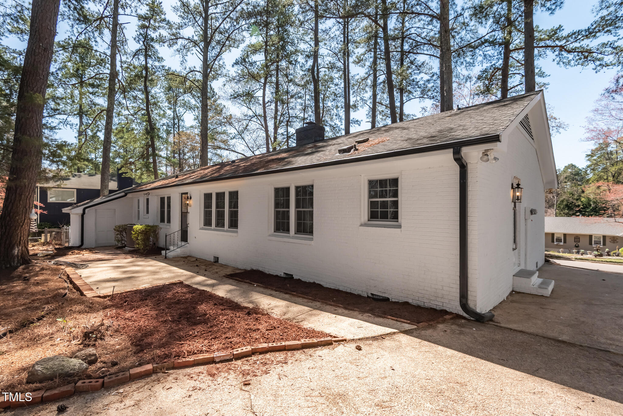 5812 Timber Ridge Drive Raleigh, NC 27609 - Photo 34 of 38 a house view with a outdoor space