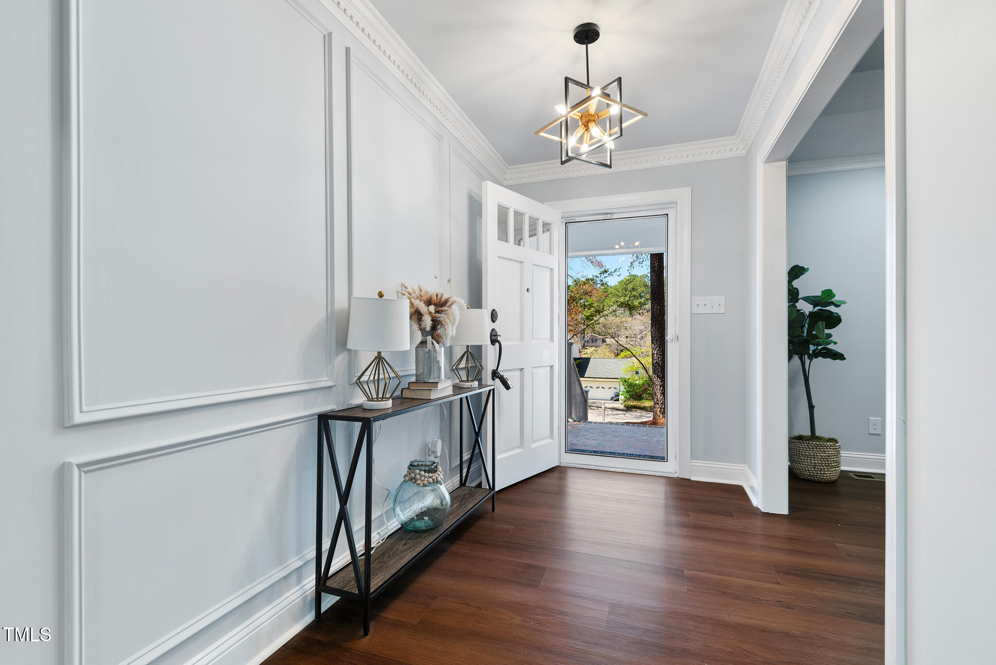 5812 Timber Ridge Drive Raleigh, NC 27609 - Photo 3 of 38 a view of an entryway with wooden floor