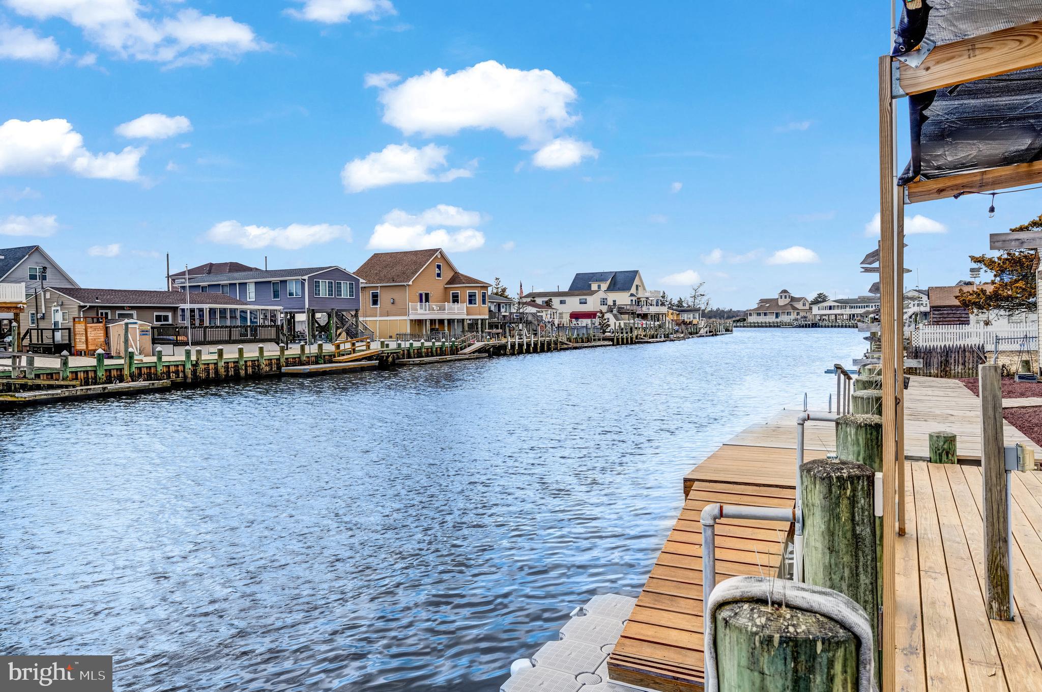 80 Dolphin Road Tuckerton, NJ 08087 - Photo 13 of 33 a view of a lake with a terrace