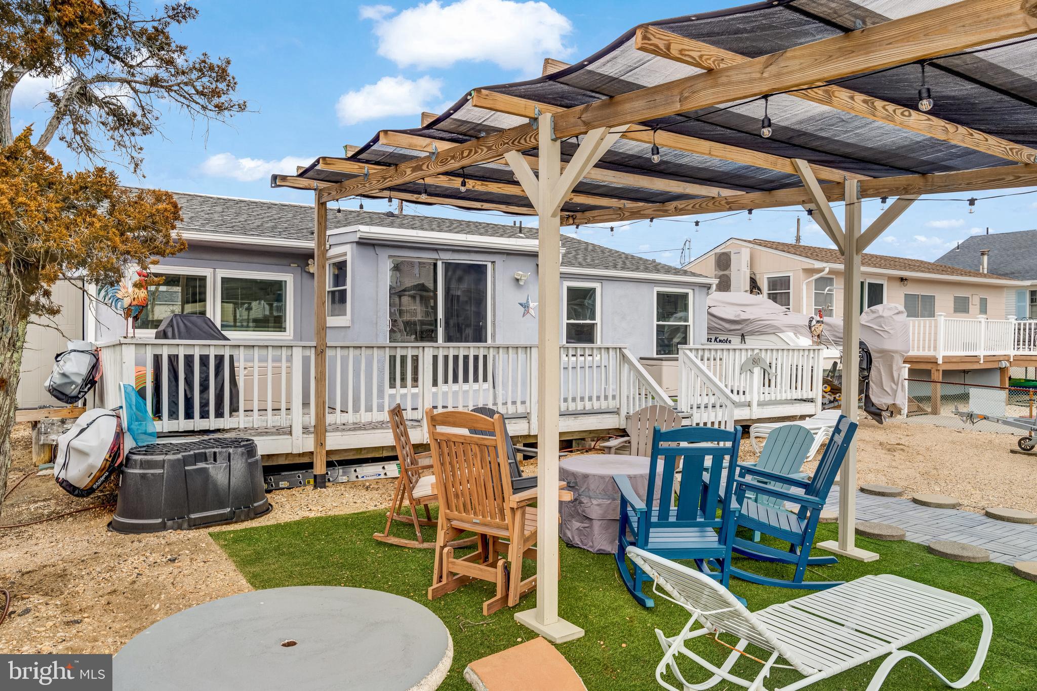 80 Dolphin Road Tuckerton, NJ 08087 - Photo 14 of 33 a patio with table and chairs