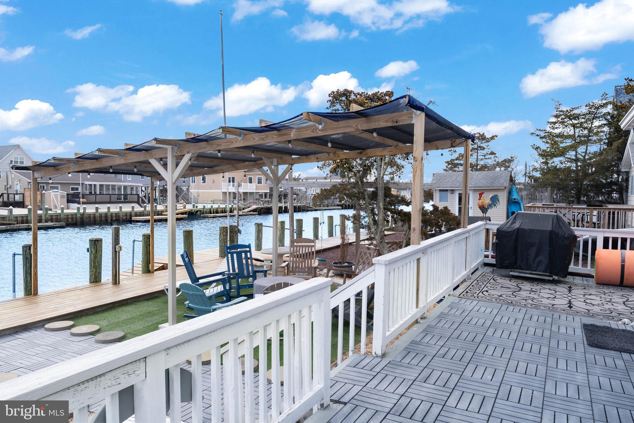 80 Dolphin Road Tuckerton, NJ 08087 - Photo 16 of 33 a view of a house with wooden deck