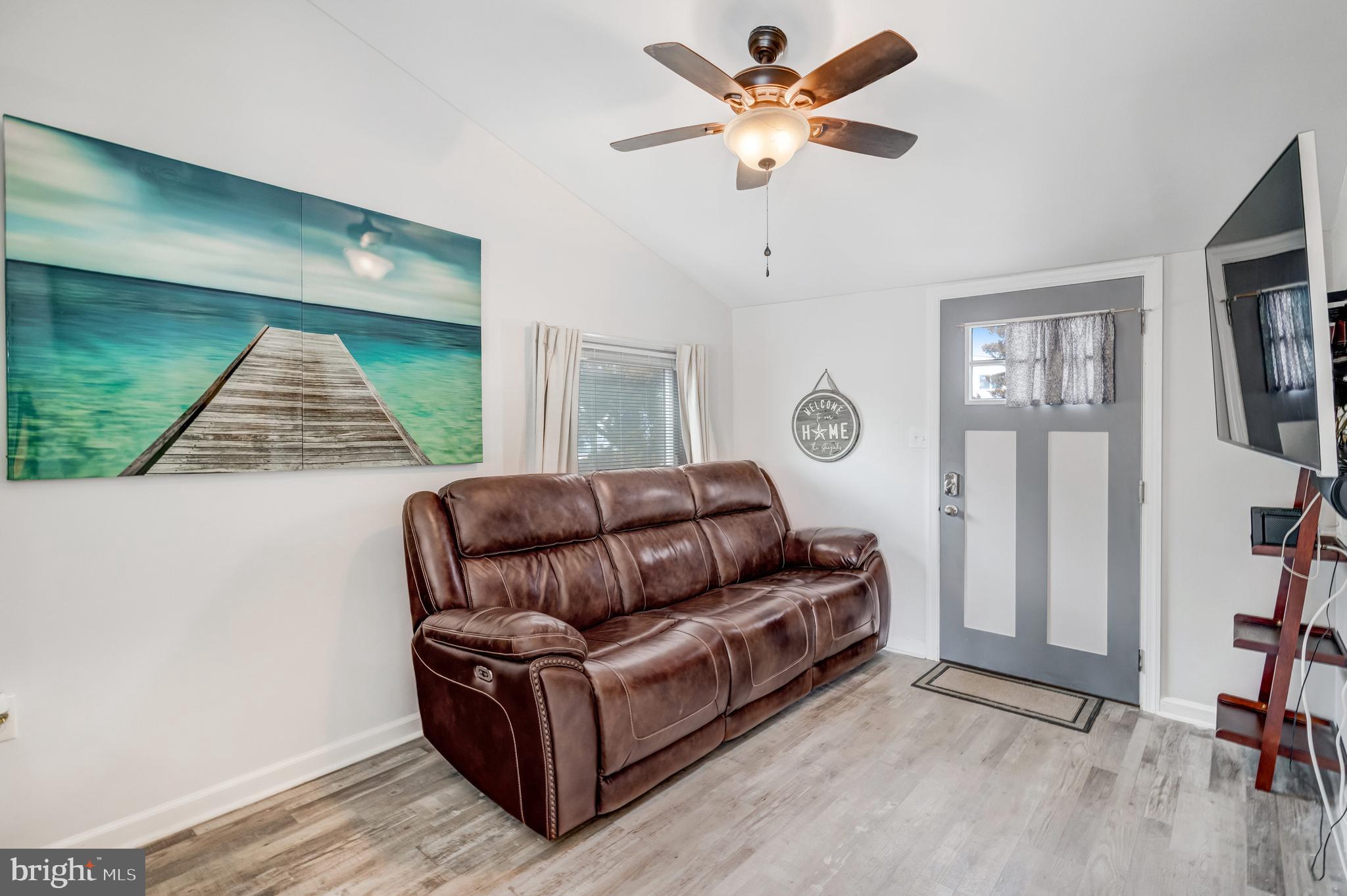 80 Dolphin Road Tuckerton, NJ 08087 - Photo 18 of 33 a living room with furniture and a window