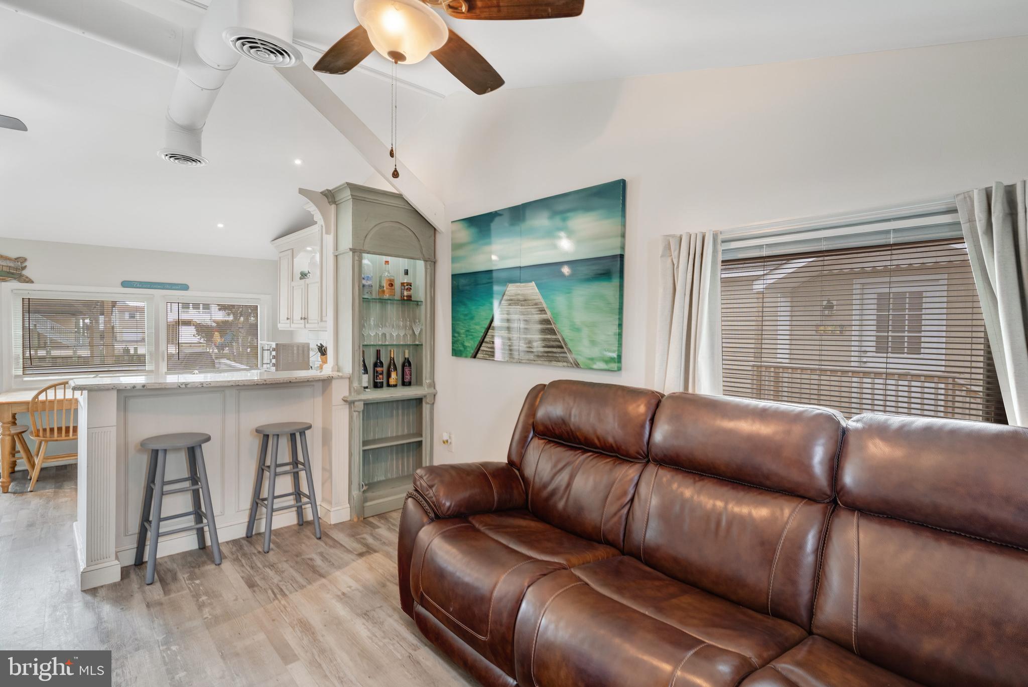 80 Dolphin Road Tuckerton, NJ 08087 - Photo 19 of 33 a living room with furniture and a large window