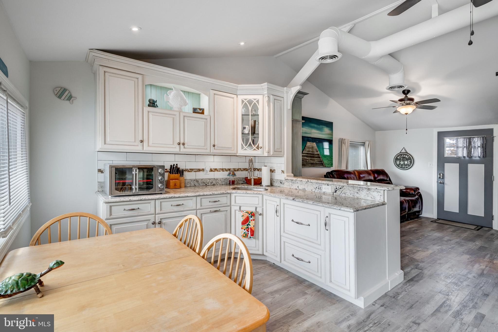 80 Dolphin Road Tuckerton, NJ 08087 - Photo 22 of 33 a kitchen with a sink stove and cabinets