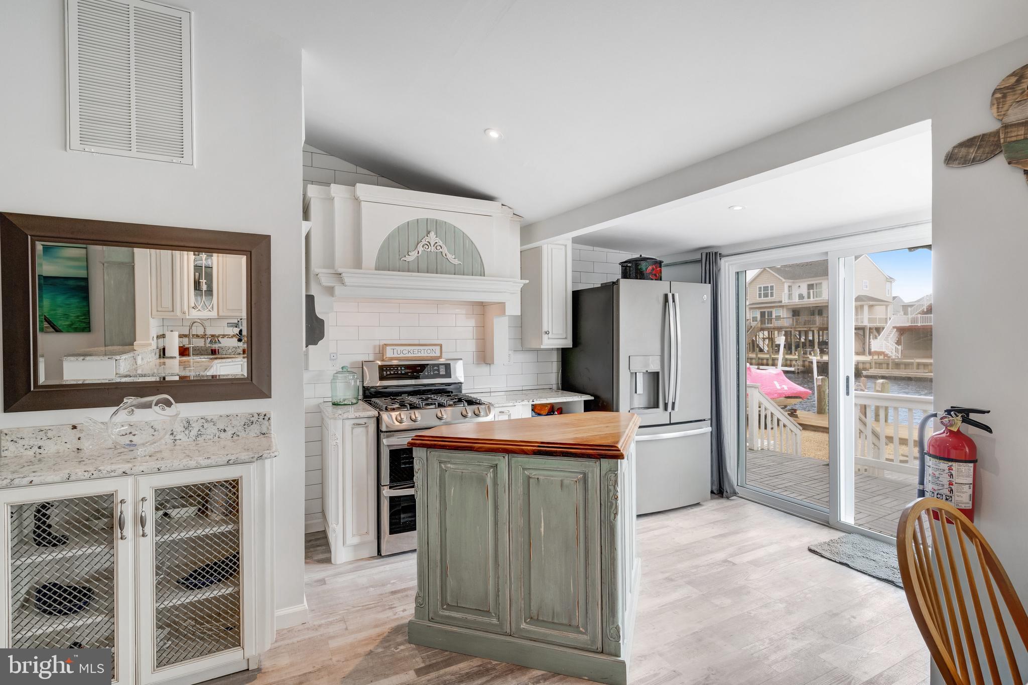 80 Dolphin Road Tuckerton, NJ 08087 - Photo 24 of 33 a kitchen with refrigerator and cabinets
