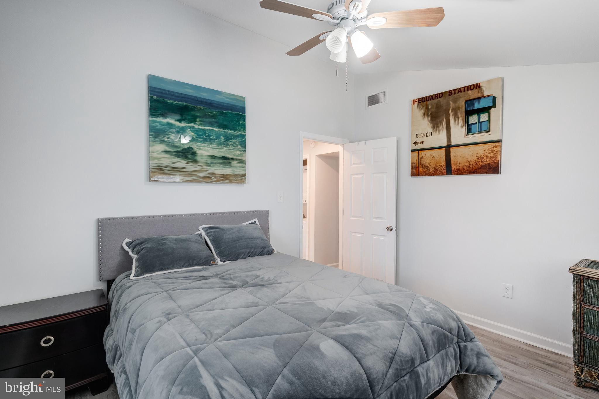 80 Dolphin Road Tuckerton, NJ 08087 - Photo 29 of 33 a bedroom with a bed and painting on the wall