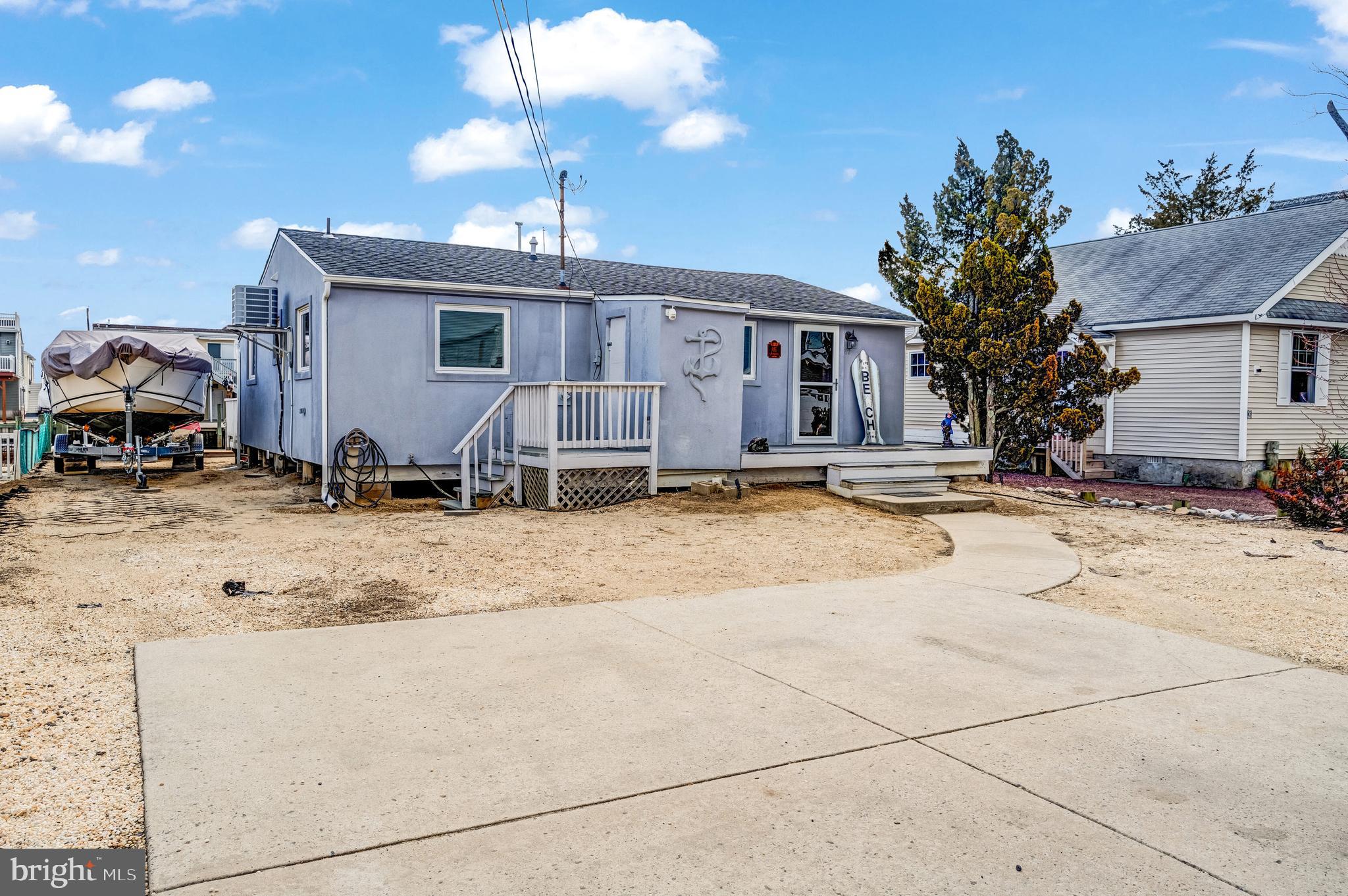 80 Dolphin Road Tuckerton, NJ 08087 - Photo 6 of 33 a view of a house with a yard