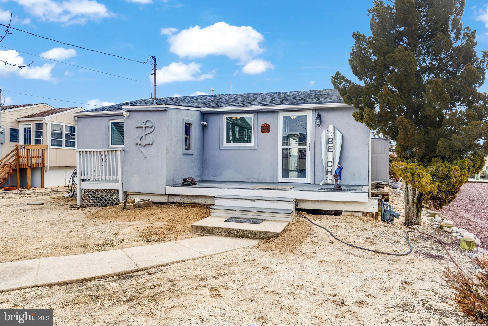 80 Dolphin Road Tuckerton, NJ 08087 - Photo 7 of 33 a view of a house with a snow in the yard