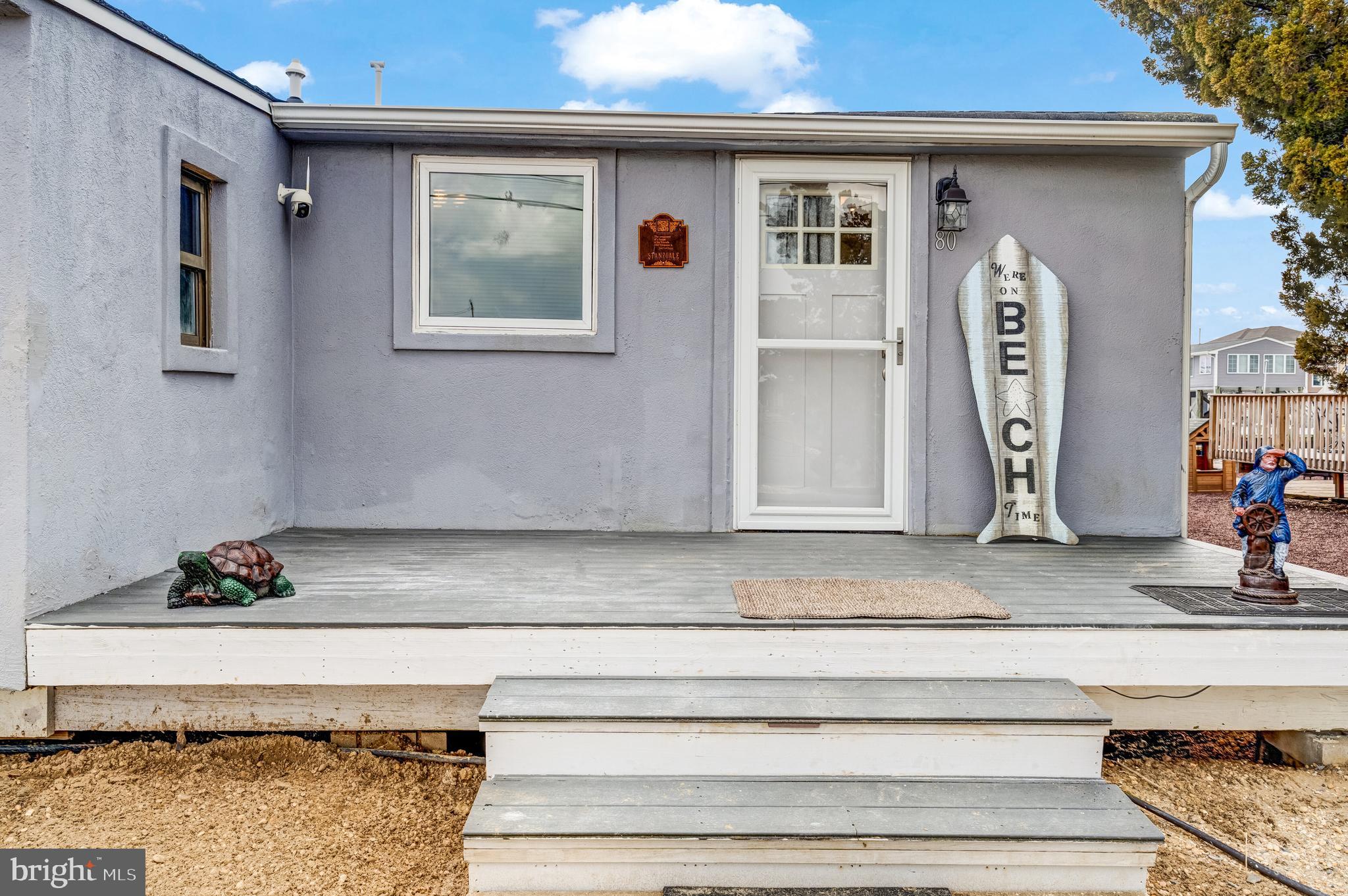 80 Dolphin Road Tuckerton, NJ 08087 - Photo 8 of 33 a front view of a house with entryway