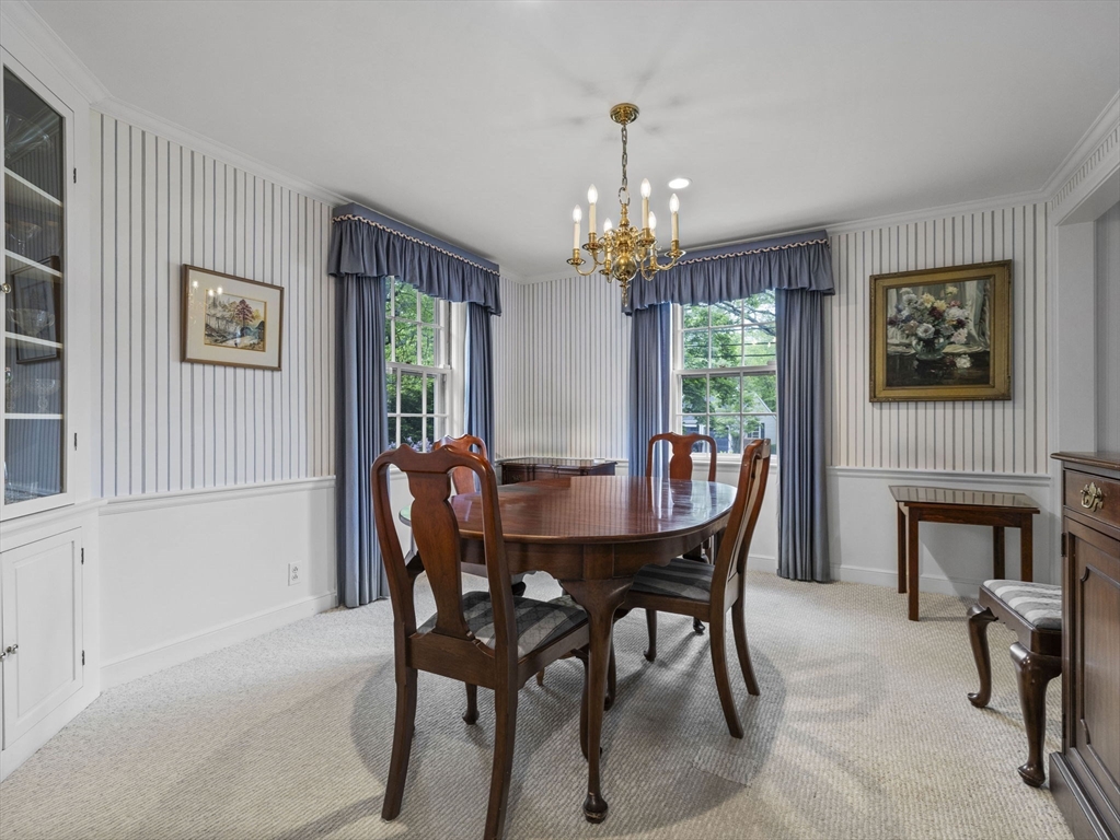 45 Mayo Road Wellesley, MA 02482 - Photo 3 of 10 a view of a dining room with furniture window and wooden floor