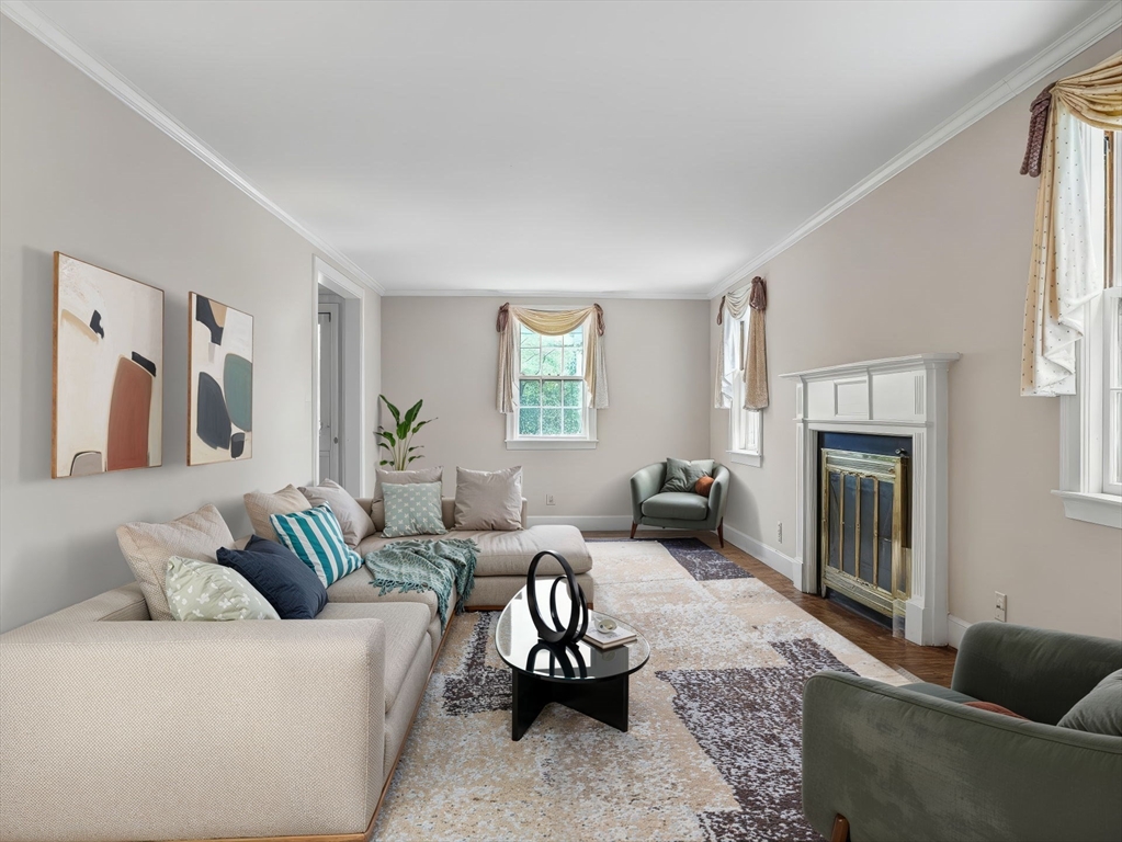 45 Mayo Road Wellesley, MA 02482 - Photo 4 of 10 a living room with furniture and a fireplace