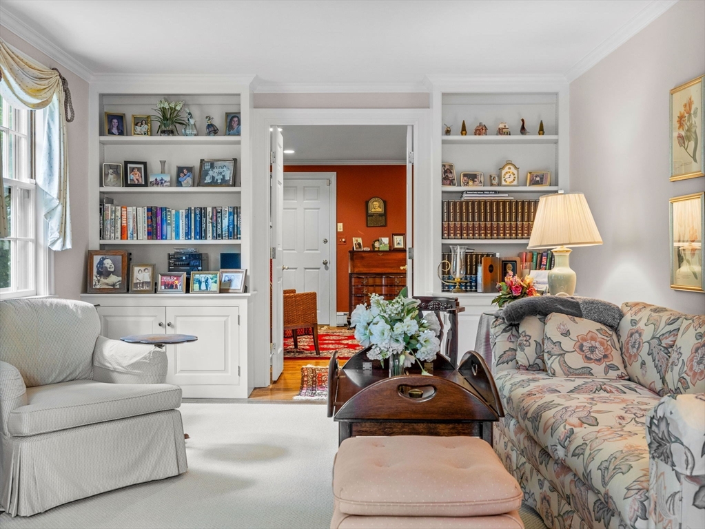 45 Mayo Road Wellesley, MA 02482 - Photo 5 of 10 a living room with furniture and a potted plant