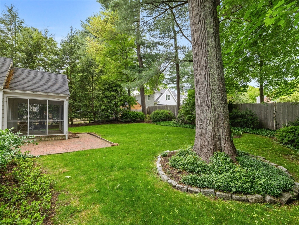 45 Mayo Road Wellesley, MA 02482 - Photo 8 of 10 a view of backyard with a garden and trees