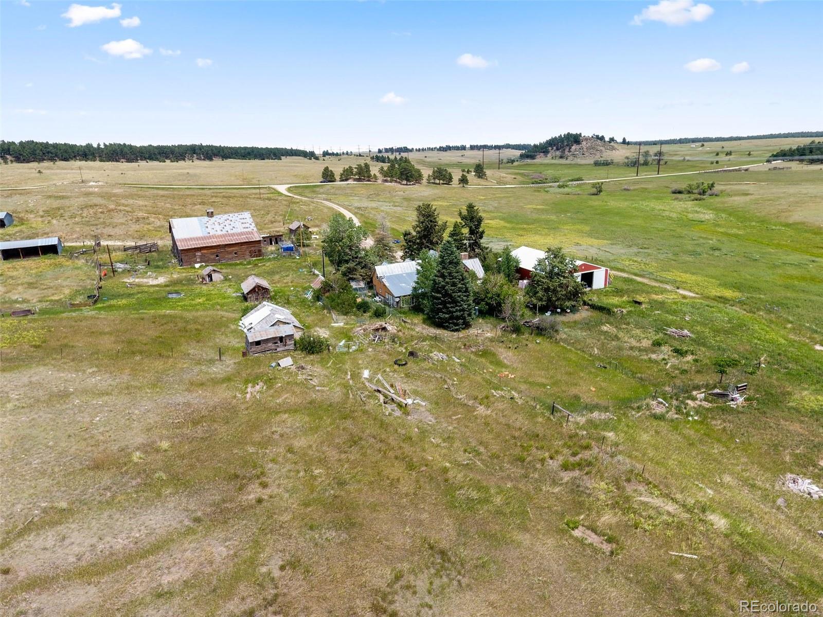 10565 County Line Road Elbert, CO 80106 - Photo 3 of 19 a view of a lake with a beach