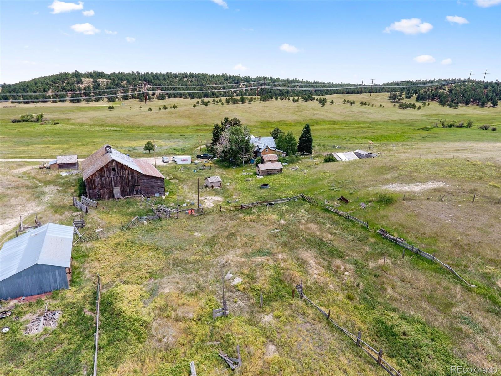 10565 County Line Road Elbert, CO 80106 - Photo 4 of 19 a view of a lake with a city view