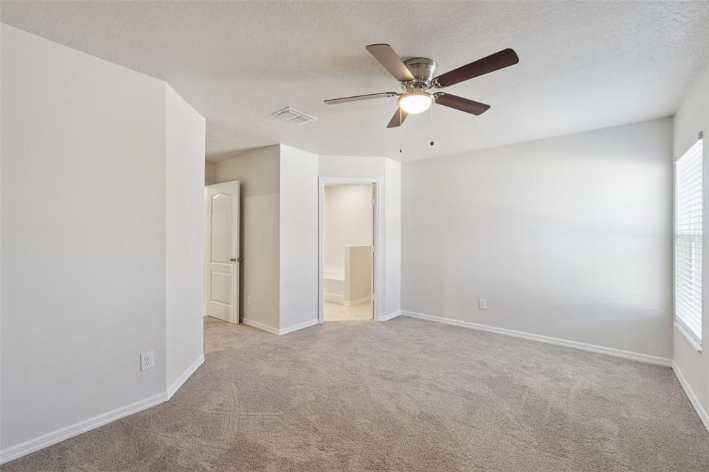 1729 Canaan Loop Dundee, FL 33838 - Photo 15 of 33 a view of an empty room