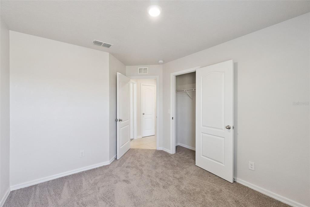 1729 Canaan Loop Dundee, FL 33838 - Photo 26 of 33 a view of an empty room