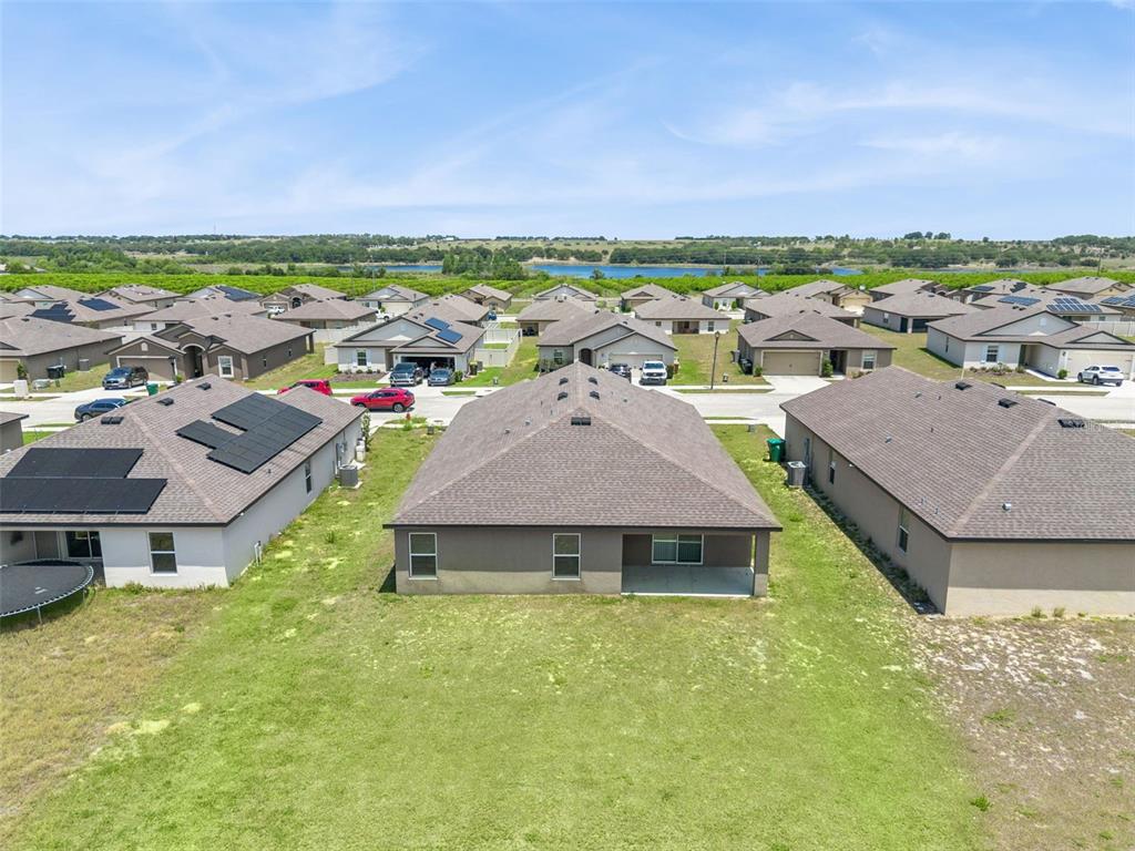 1729 Canaan Loop Dundee, FL 33838 - Photo 30 of 33 a view of a town with big houses